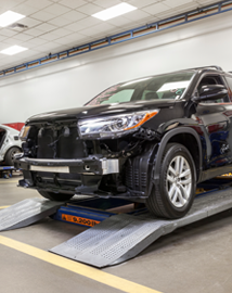 Toyota on vehicle lift | Koons Annapolis Toyota in Annapolis MD