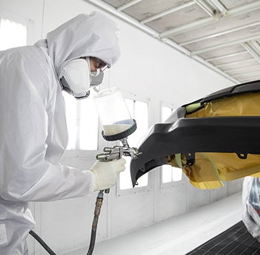 Collision Center Technician Painting a Vehicle | Koons Annapolis Toyota in Annapolis MD